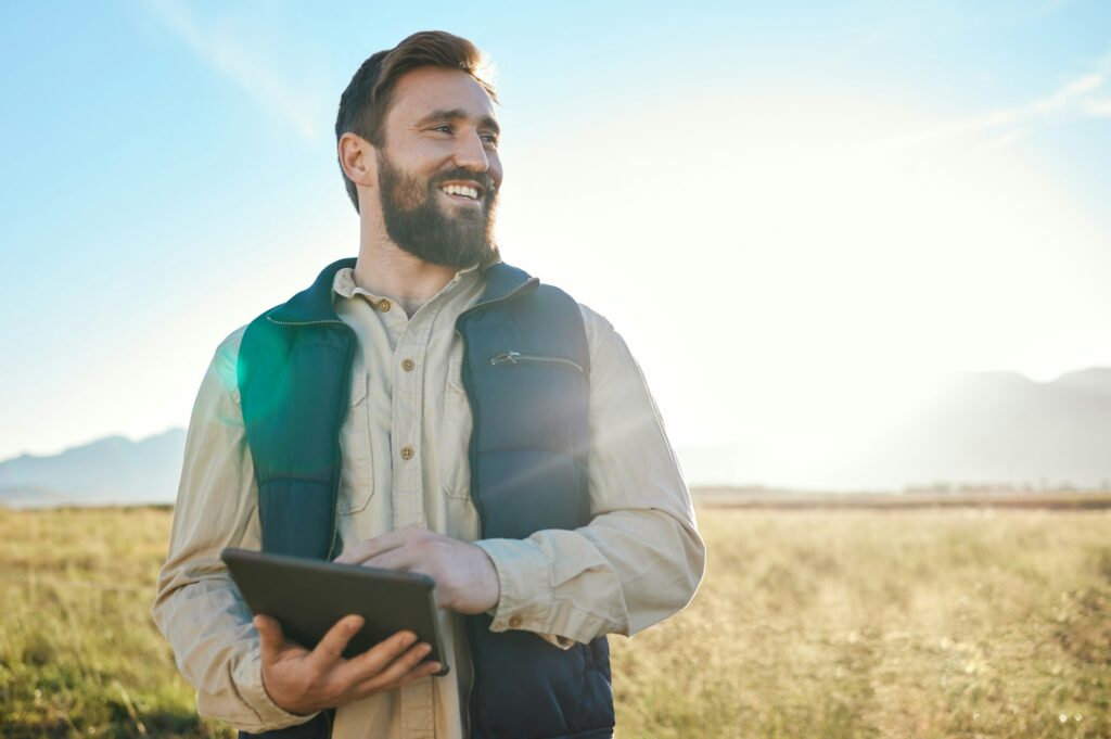 Research or agriculture man on tablet on farm for sustainability, production or industry growth ana