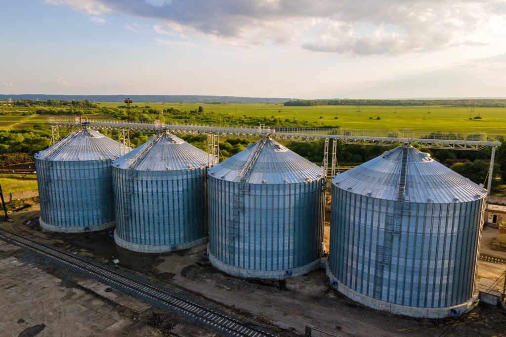 Aerial view of industrial ventilated silos for long term storage of grain and oilseed.
